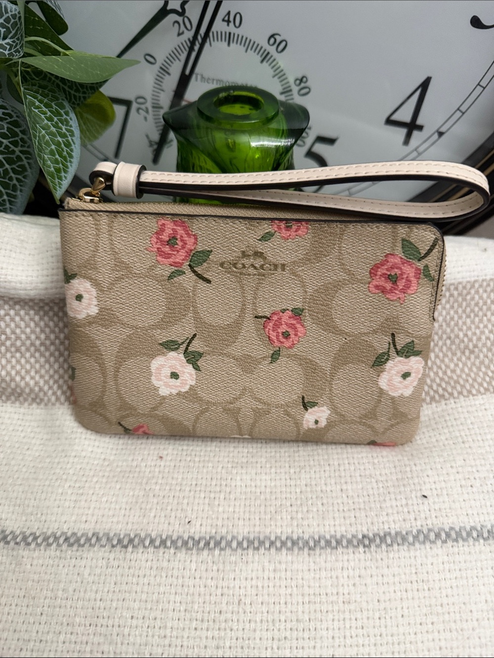 Coach Beige Signature Canvas Floral Wristlet with Pink Accents